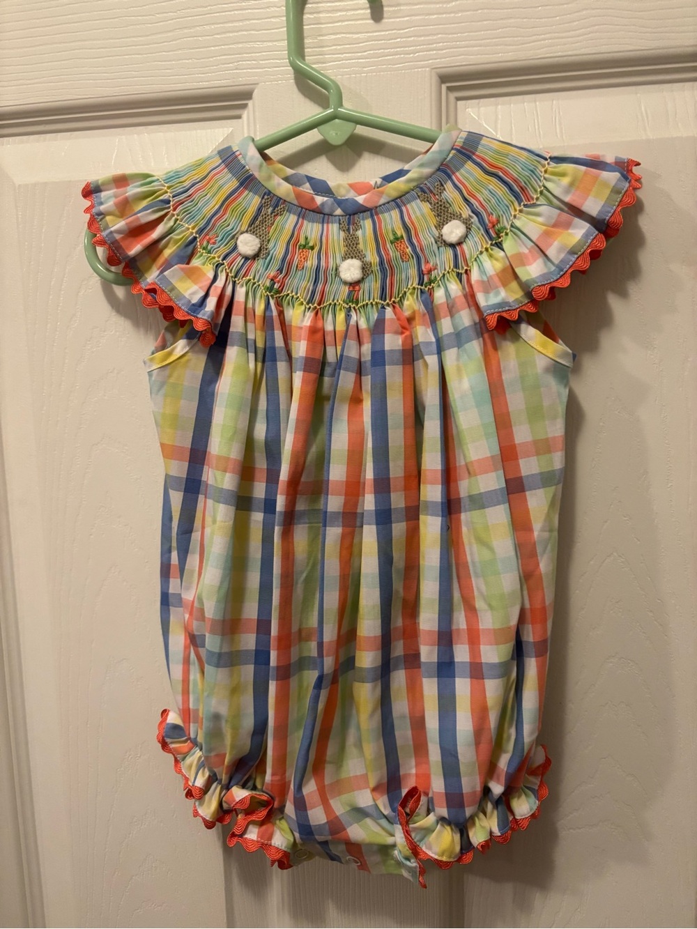 NWOT Multicolor Plaid Smocked Bubble Romper with Bunny Embroidery and Pom Trim